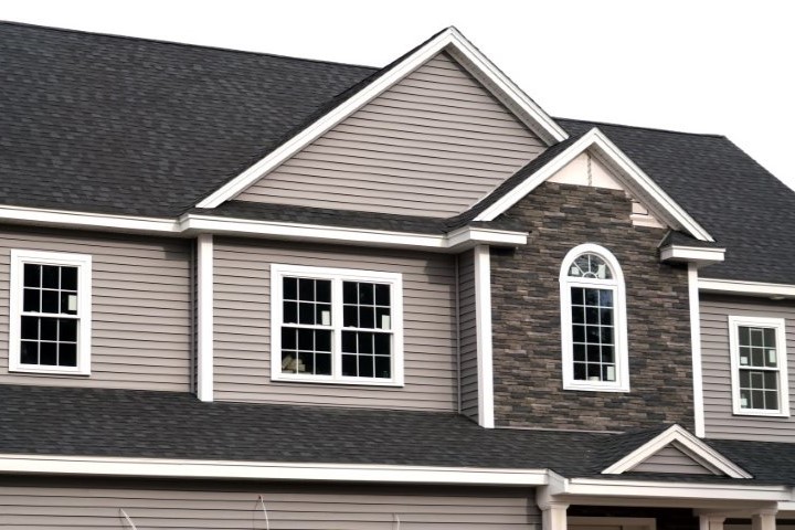 Residential home with new shingles installed by Jeranco Roofing & Exteriors